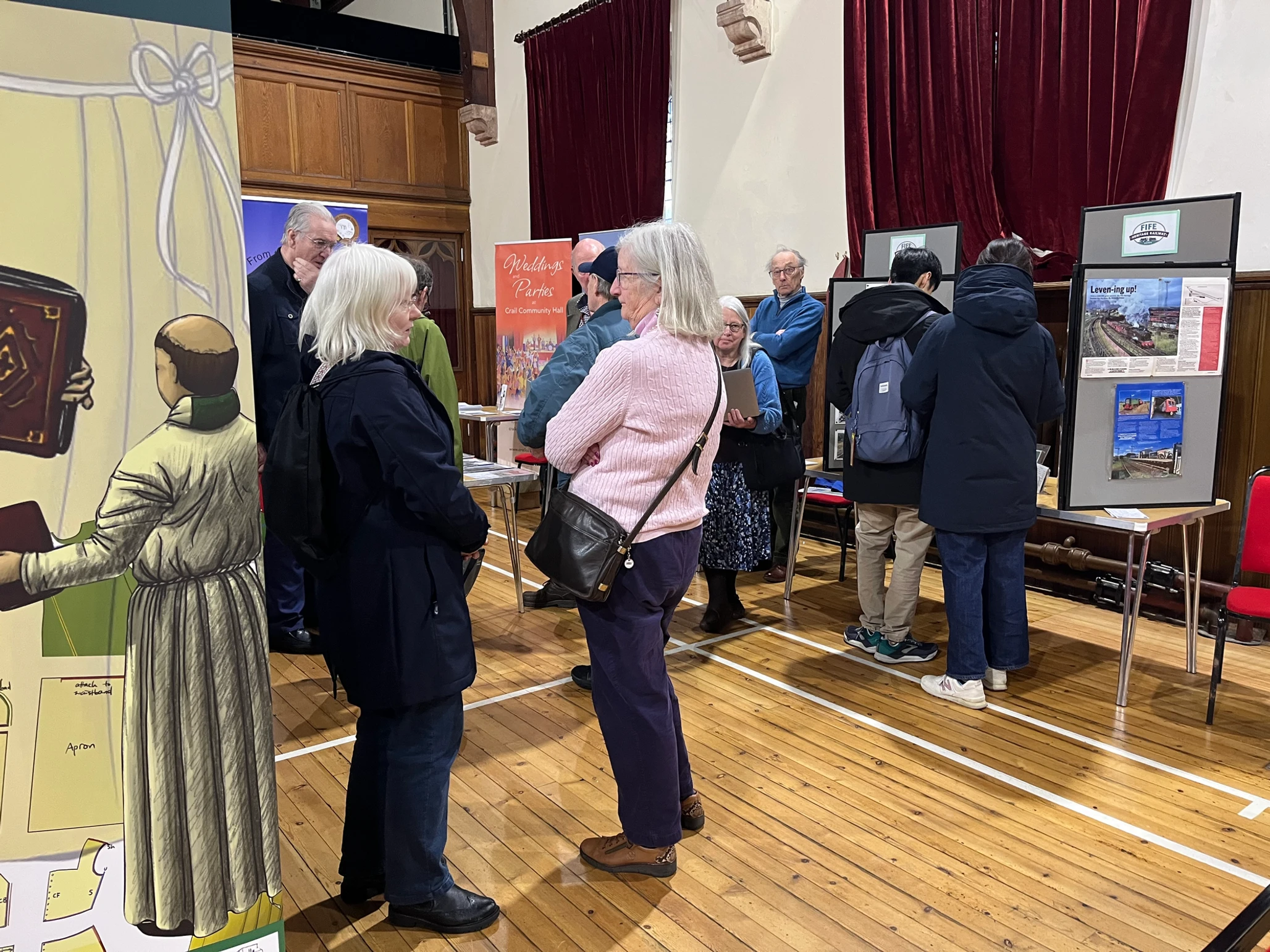 Heritage groups discussing and viewing stalls at our recent Dundee & Fife Roadshow.